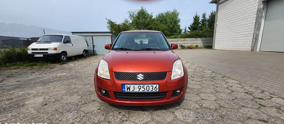 Suzuki Swift cena 12900 przebieg: 156230, rok produkcji 2009 z Warszawa małe 67